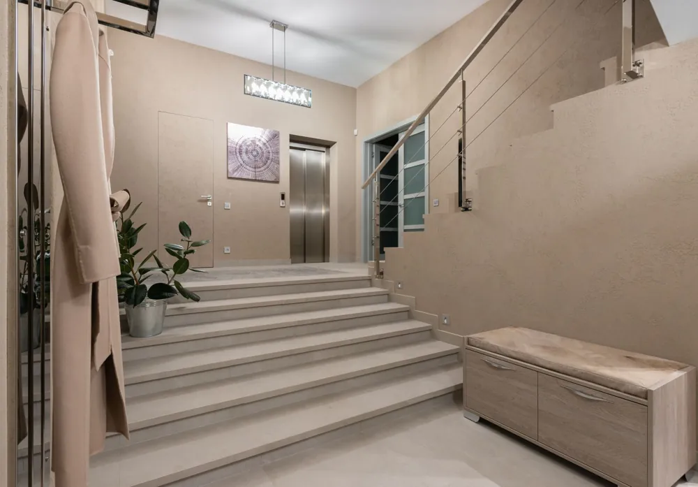 Stock photo: bright apartment building entrance hall with staircase and lift
